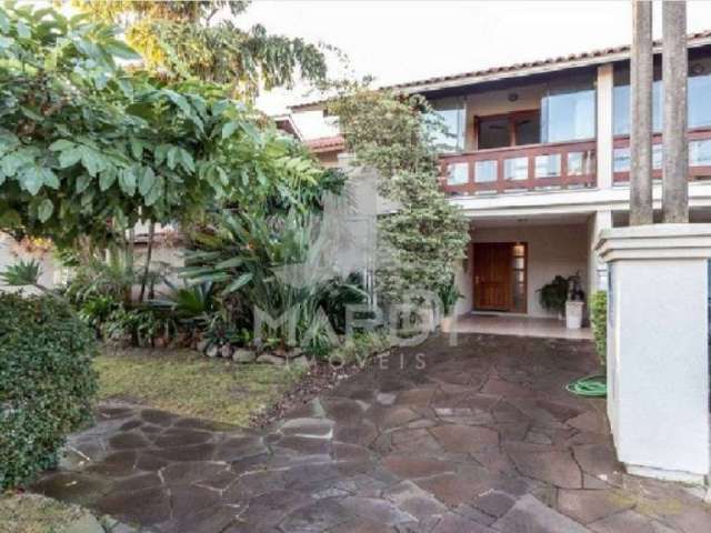 Casa em condomínio fechado com 3 quartos à venda na Avenida Eduardo Prado, 2050, Cavalhada, Porto Alegre por R$ 960.000