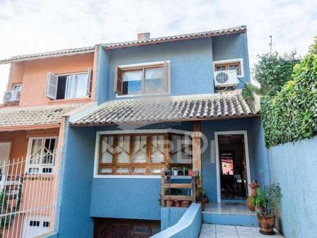 Casa com 3 quartos à venda na Rua Padre João Batista Reus, 488, Vila Conceição, Porto Alegre por R$ 1.017.000