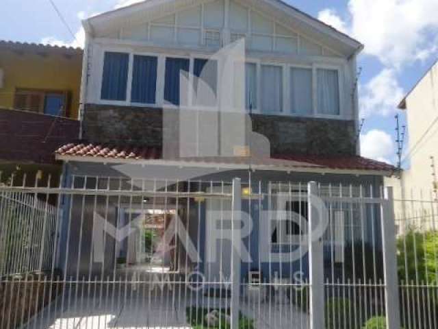 Casa com 3 quartos à venda na Rua Carlos Scliar, 99, Hípica, Porto Alegre por R$ 750.000