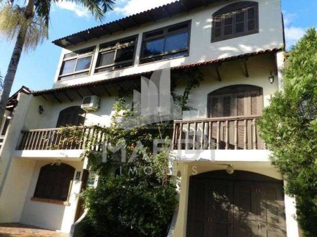 Casa em condomínio fechado com 5 quartos à venda na Avenida Otto Niemeyer, 1199, Tristeza, Porto Alegre por R$ 595.000