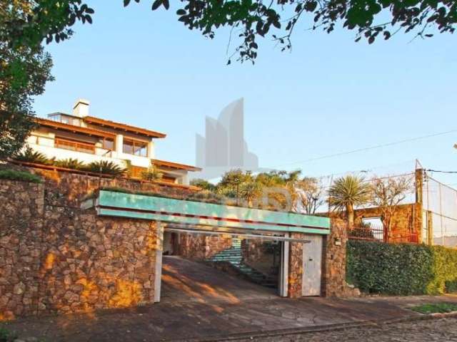 Casa com 4 quartos à venda na Rua Dona Lida Monteiro, 180, Teresópolis, Porto Alegre por R$ 1.890.000