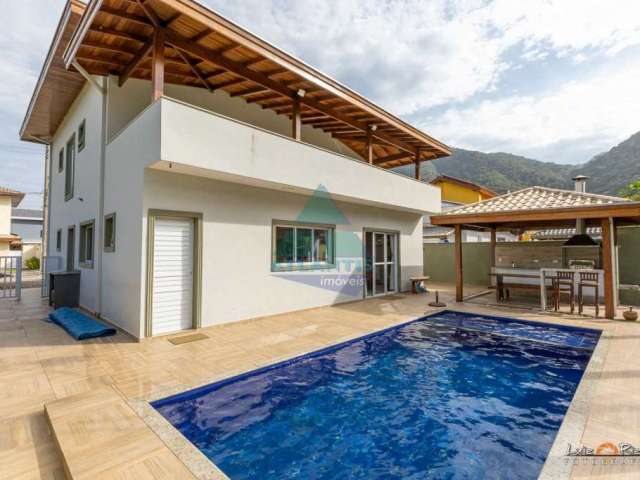 Casa em condomínio fechado com 6 quartos à venda na Avenida Engenho Velho, Praia da Lagoinha, Ubatuba por R$ 1.600.000