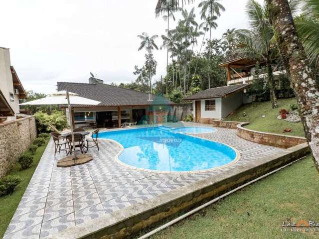 Casa em condomínio fechado com 3 quartos à venda na Rua João de Barro, Praia da Lagoinha, Ubatuba, 171 m2 por R$ 1.800.000