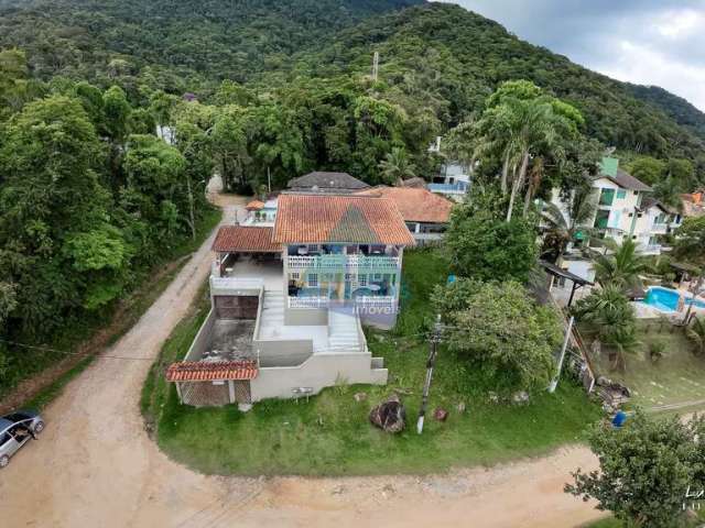 Casa em condomínio fechado com 4 quartos à venda na Rua das Rosas, Praia da Lagoinha, Ubatuba, 517 m2 por R$ 1.500.000