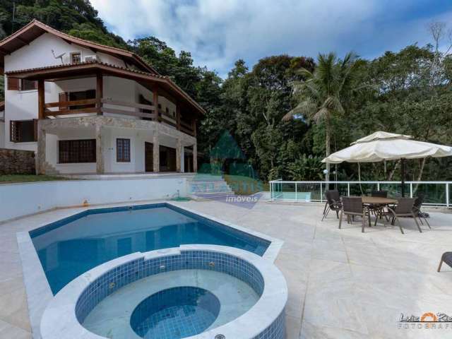 Casa em condomínio fechado com 5 quartos à venda na Rua Sabiá, Praia da Lagoinha, Ubatuba por R$ 3.800.000