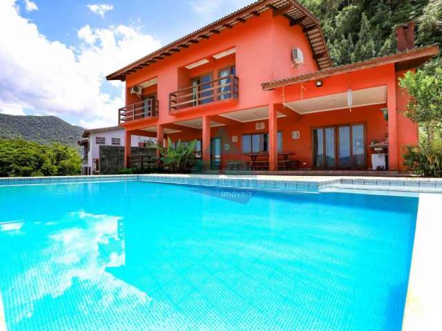 Casa em condomínio fechado com 3 quartos à venda na Rua Sabiá, Praia da Lagoinha, Ubatuba, 460 m2 por R$ 2.300.000