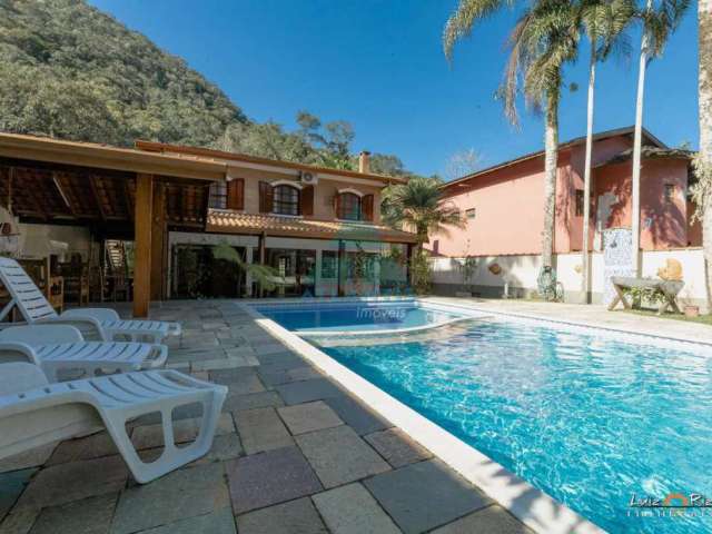 Casa em condomínio fechado com 4 quartos à venda na Rua Sabiá, Praia da Lagoinha, Ubatuba, 269 m2 por R$ 3.100.000