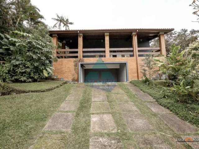 Casa em condomínio fechado com 3 quartos à venda na Rua Sabiá, Praia da Lagoinha, Ubatuba, 211 m2 por R$ 1.300.000