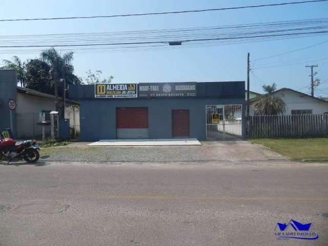 Casa com terreno e sala comercial