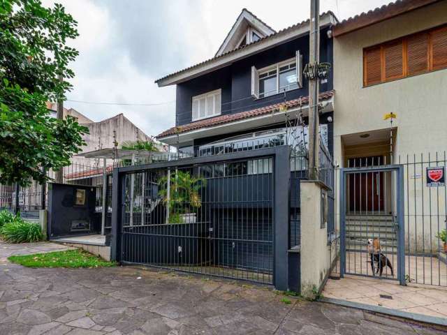 Casa em condomínio fechado com 3 quartos à venda na Rua João Paetzel, 1060, Chácara das Pedras, Porto Alegre por R$ 1.500.000