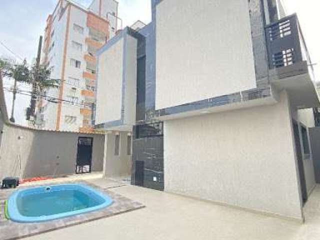 Sobrado com 3 dormitórios à venda, 86 m² por R$ 790.000,00 - Tupi - Praia Grande/SP