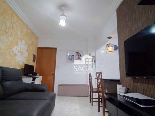 Apartamento com 2 dormitórios à venda, 58 m² por R$ 350.000,00 - Vila Guilhermina - Praia Grande/SP