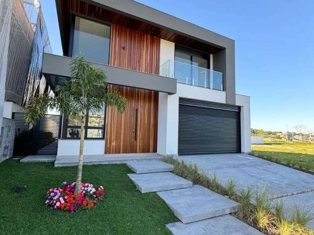 Casa Reserva da Pedra na Pedra Branca com 3 suítes, 4 banheiros e 2 vagas de garagem