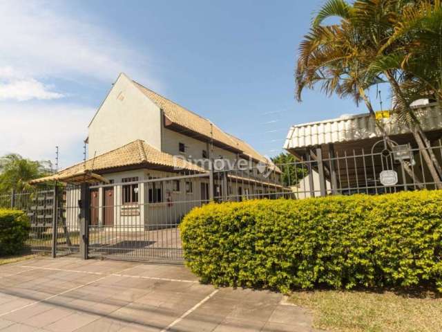 Casa em condomínio fechado com 3 quartos à venda na Rua Camaquã, 206, Camaquã, Porto Alegre por R$ 420.000