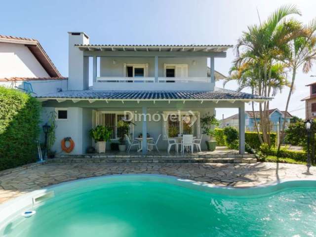 Casa com 4 quartos à venda na Rua Paulo Derly Strehl, 187, Espírito Santo, Porto Alegre por R$ 1.120.000