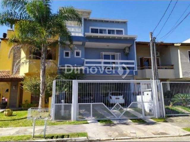 Casa em condomínio fechado com 3 quartos à venda na Rua Guatambu, 398, Hípica, Porto Alegre por R$ 640.000