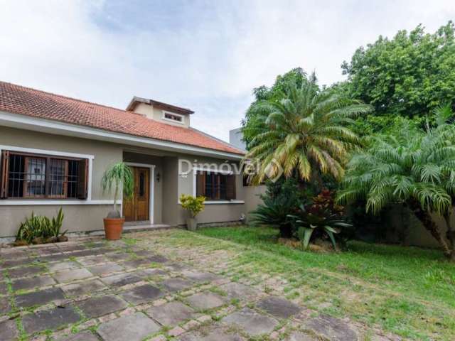 Casa com 3 quartos à venda na JAYME SAUL DE BORBA, 40, Guarujá, Porto Alegre por R$ 650.000