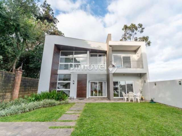 Casa em condomínio fechado com 3 quartos à venda na Rua Francisco Solano Borges, 200, Hípica, Porto Alegre por R$ 1.065.000