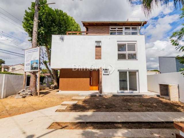 Casa em condomínio fechado com 3 quartos à venda na Rua dos Guenoas, 1200, Guarujá, Porto Alegre por R$ 720.000