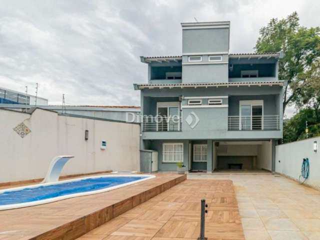 Casa com 4 quartos à venda na Avenida Nonoai, 724, Nonoai, Porto Alegre por R$ 2.390.000