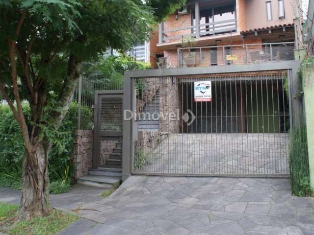 Casa com 3 quartos à venda na Rua Edgar Luiz Schneider, 490, Jardim Isabel, Porto Alegre por R$ 1.350.000