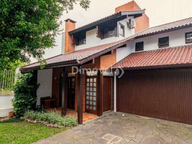 Casa com 3 quartos à venda na Rua Almirante Delamare, 170, Tristeza, Porto Alegre por R$ 1.300.000