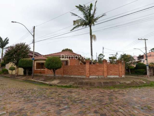 Casa com 3 quartos à venda na Rua Oiampi, 420, Guarujá, Porto Alegre por R$ 550.000