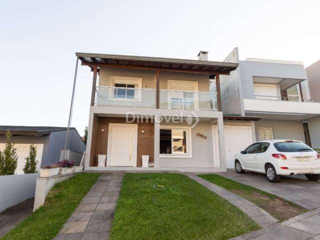 Casa em condomínio fechado com 4 quartos à venda na Rua Francisco Solano Borges, 200, Hípica, Porto Alegre por R$ 940.000