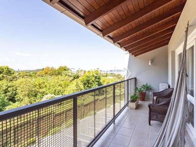 Casa em condomínio fechado com 3 quartos à venda na Avenida Coronel Marcos, 240, Pedra Redonda, Porto Alegre por R$ 950.000