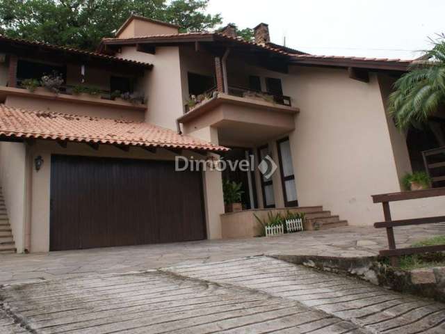 Casa com 3 quartos à venda na Rua Edgar Luiz Schneider, 510, Jardim Isabel, Porto Alegre por R$ 145.000