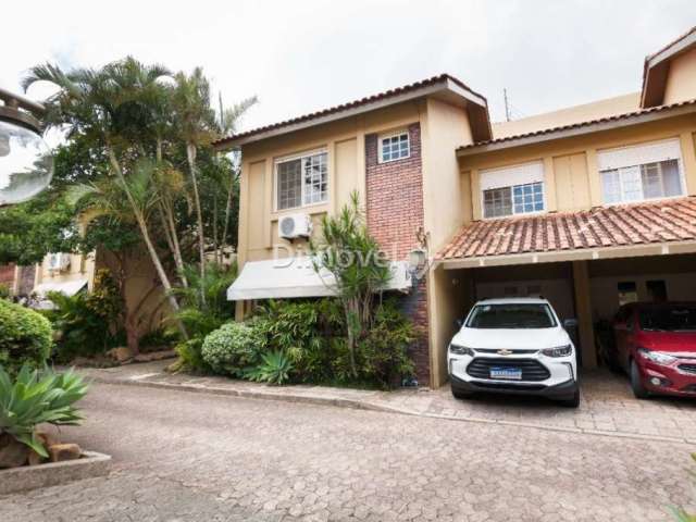 Casa em condomínio fechado com 3 quartos à venda na Rua Doutor Armando Barbedo, 832, Tristeza, Porto Alegre por R$ 870.000