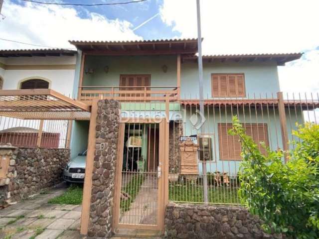 Casa com 4 quartos à venda na Rua Mário Assumpção, 15, Guarujá, Porto Alegre por R$ 750.000