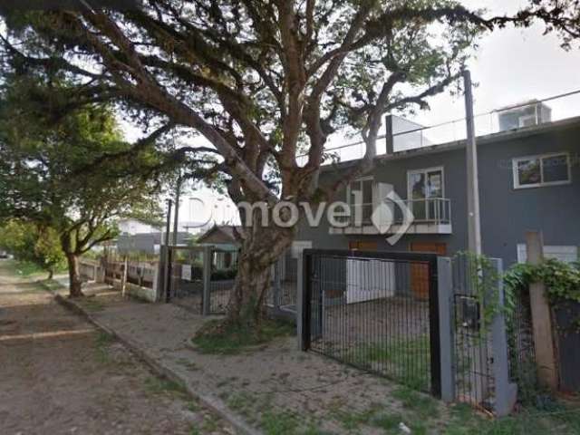 Casa com 3 quartos à venda na Rua Jacundá, 87, Guarujá, Porto Alegre por R$ 500.000