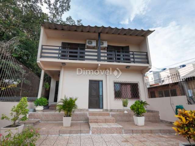 Casa com 4 quartos à venda na Avenida Belém Velho, 2335, Vila Nova, Porto Alegre por R$ 695.000