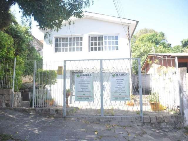 Casa com 3 quartos à venda na Rua Liberal, 1115, Tristeza, Porto Alegre por R$ 480.000