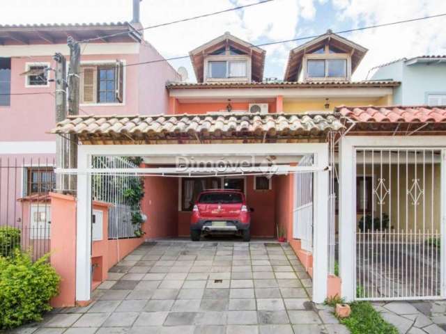 Casa com 3 quartos à venda na Rua James Bocacio, 116, Aberta dos Morros, Porto Alegre por R$ 420.000