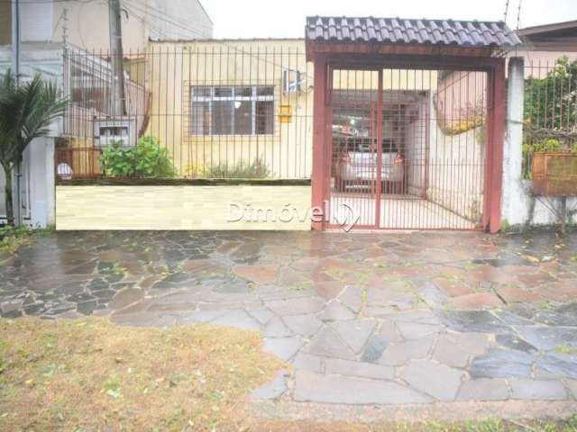 Casa com 4 quartos à venda na Rua Cachoeira, 396, Nonoai, Porto Alegre por R$ 370.000