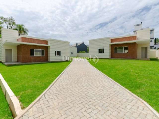 Casa em condomínio fechado com 3 quartos à venda na Rua Canísio Binsfeld, 226, Hípica, Porto Alegre por R$ 675.000