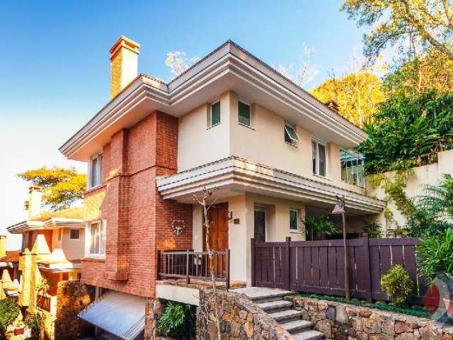 Casa em condomínio fechado com 3 quartos à venda na Avenida Coronel Marcos, 760, Pedra Redonda, Porto Alegre por R$ 1.780.000