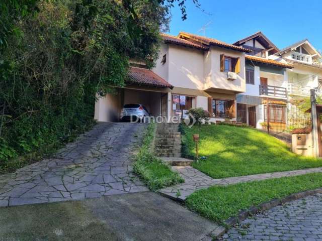 Casa com 3 quartos à venda na Rua Edgar Luiz Schneider, 12, Jardim Isabel, Porto Alegre por R$ 560.000