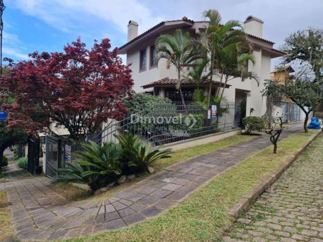 Casa com 3 quartos à venda na Rua Edgar Luiz Schneider, 165, Jardim Isabel, Porto Alegre por R$ 750.000