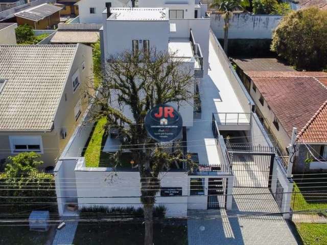 Sobrado triplex com 3 vagas no subsolo lado a lado 3 quartos sendo 1 suíte e terraço com banheiro a venda no guabirotuba