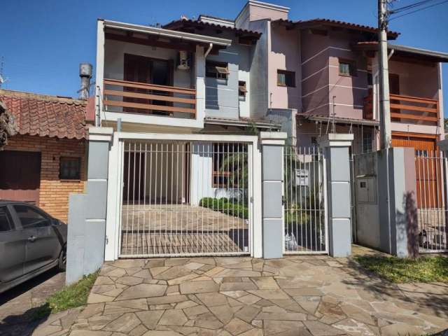 Casa com 2 quartos à venda na Rua Pelotas, 163, Centro, Esteio por R$ 400.000