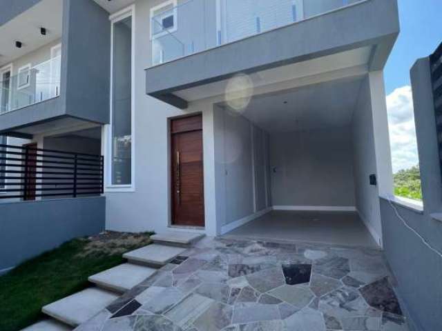 Casa com 3 quartos à venda na Padre Felipe, 2018, São Sebastião, Esteio por R$ 649.000