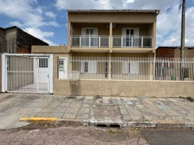 Casa com 3 quartos à venda na Padre Urbano Thiesen, 36, Parque Santo Inácio, Esteio por R$ 495.000