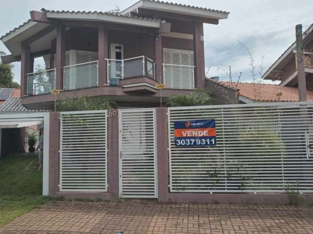 Casa com 4 quartos à venda na Das Nacoes, 69, Centro, Esteio por R$ 1.500.000