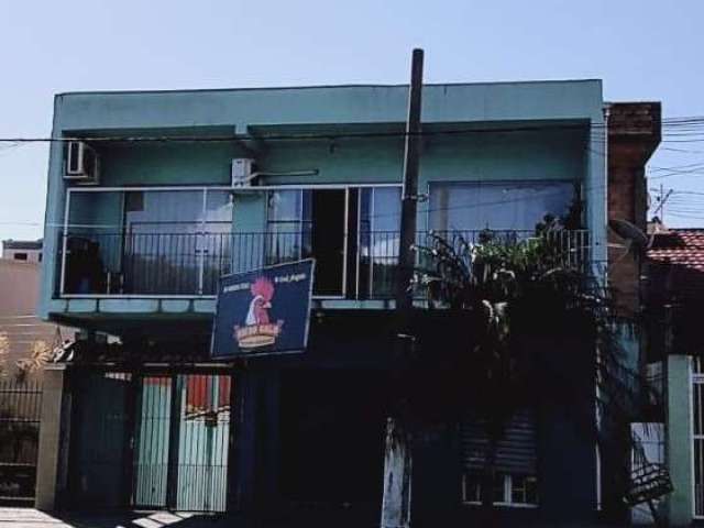 Casa com 6 quartos à venda na Rua Passo Fundo, 687, Centro, Esteio por R$ 1.200.000