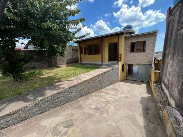 Casa com 3 quartos à venda na Rua Celestino Franco Coutinho, 350, Lomba da Palmeira, Sapucaia do Sul por R$ 450.000