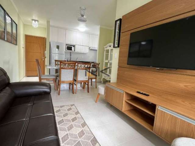 APARTAMENTO NA PRAIA GRANDE com 2 dormitórios sendo 1 suíte,1 vaga de garagem,varanda gourmet com churrasqueira,sala 2 ambientes