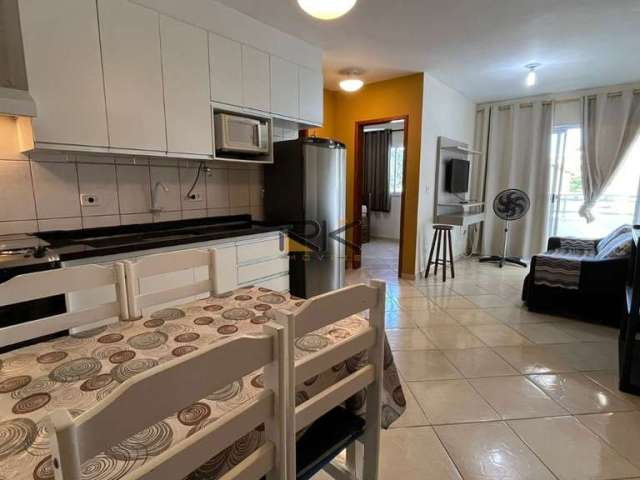 APARTAMENTO PRAIA GRANDE com 1 dormitório,1 vaga de garagem,sala 2 ambientes,1banheiro